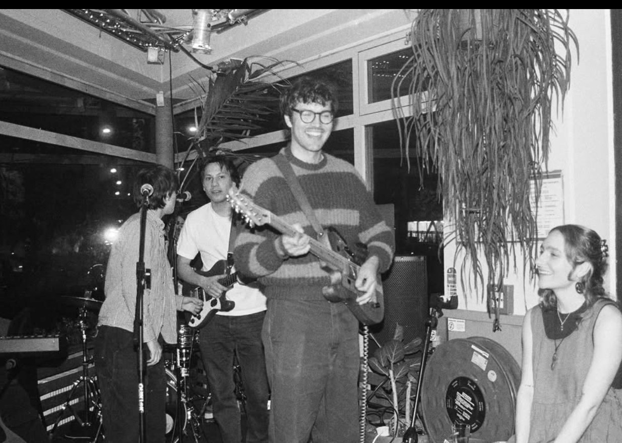 A live band playing in the café