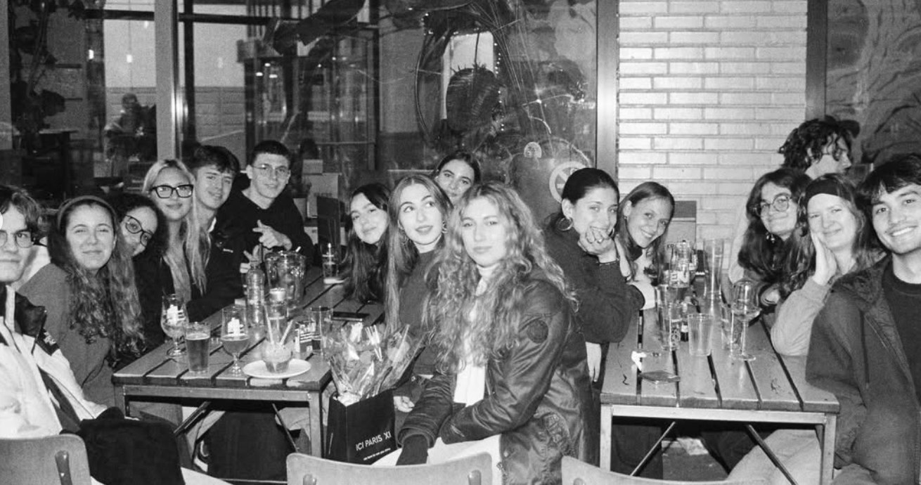 A large group of students at the tables at De Krater